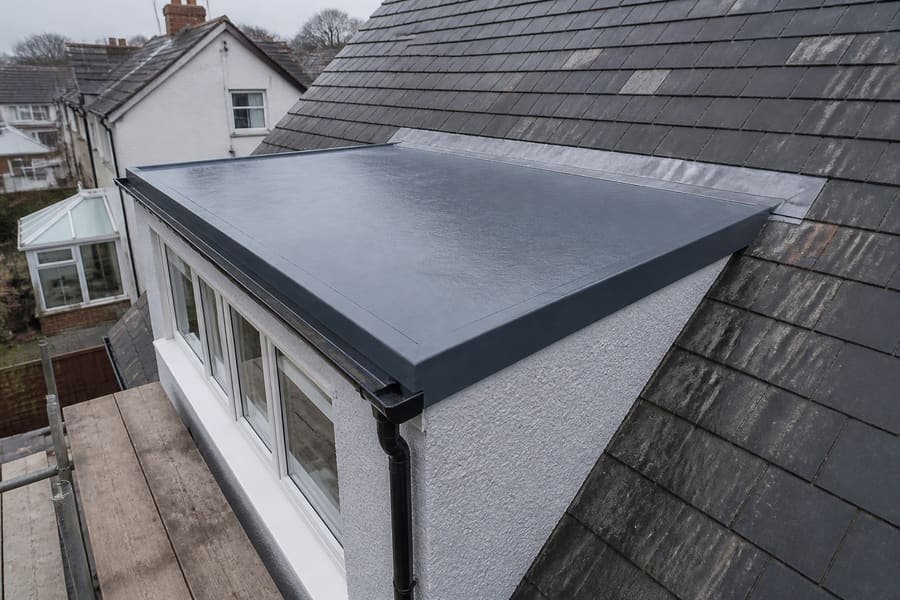 Completed GRP dormer roof with slate roof surround